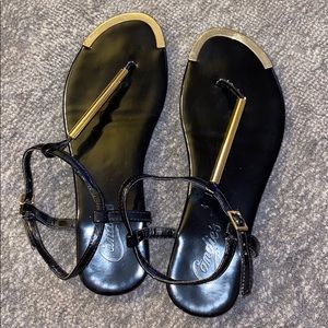 CANDIE’S black and gold sandals
